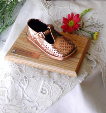 Single shoes on oak base