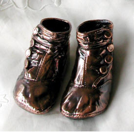 Bronzed baby shoes, unmounted antique buttontop booties