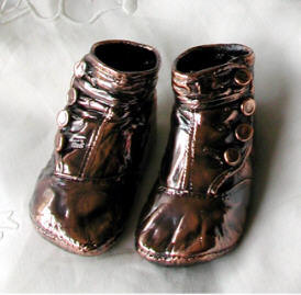 Unmounted bronzed buttontop booties